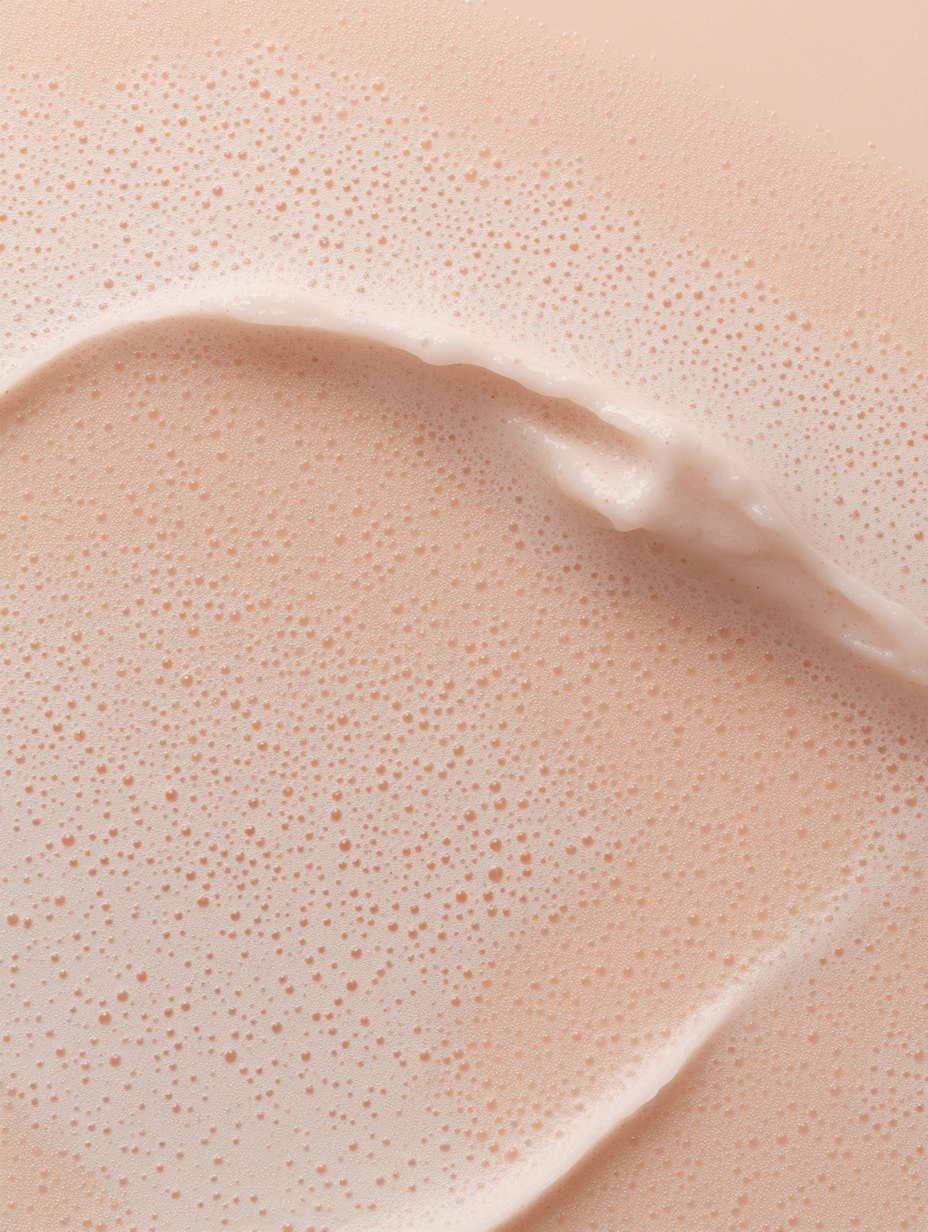 cosmetic texture closeup foamy creamy pink beige