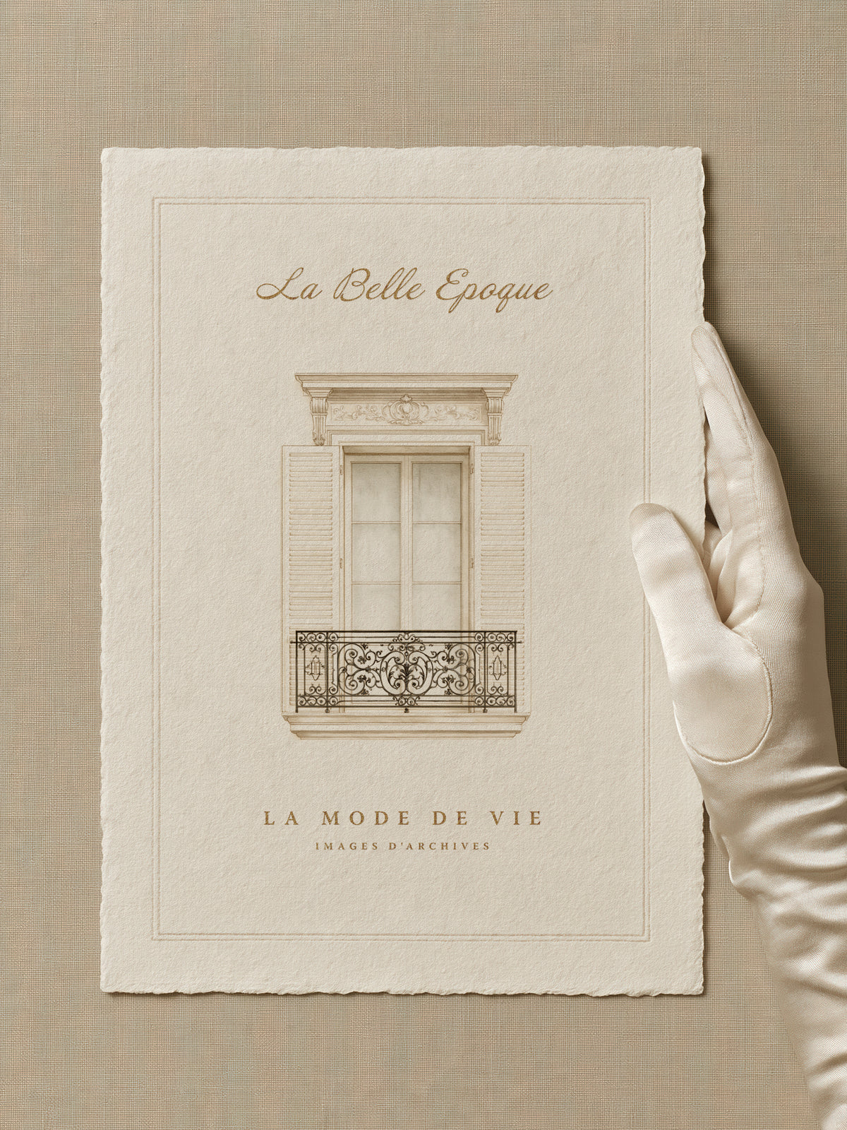 Elegant gloved hand holding deckled paper featuring a vintage French balcony illustration in a neutral beige aesthetic the words are La Belle Epoque La Mode de Vie Images d'archives