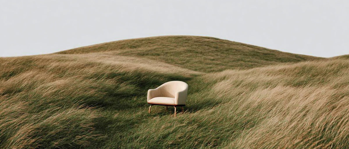 Solitary chair in open landscape on hill grass meadow