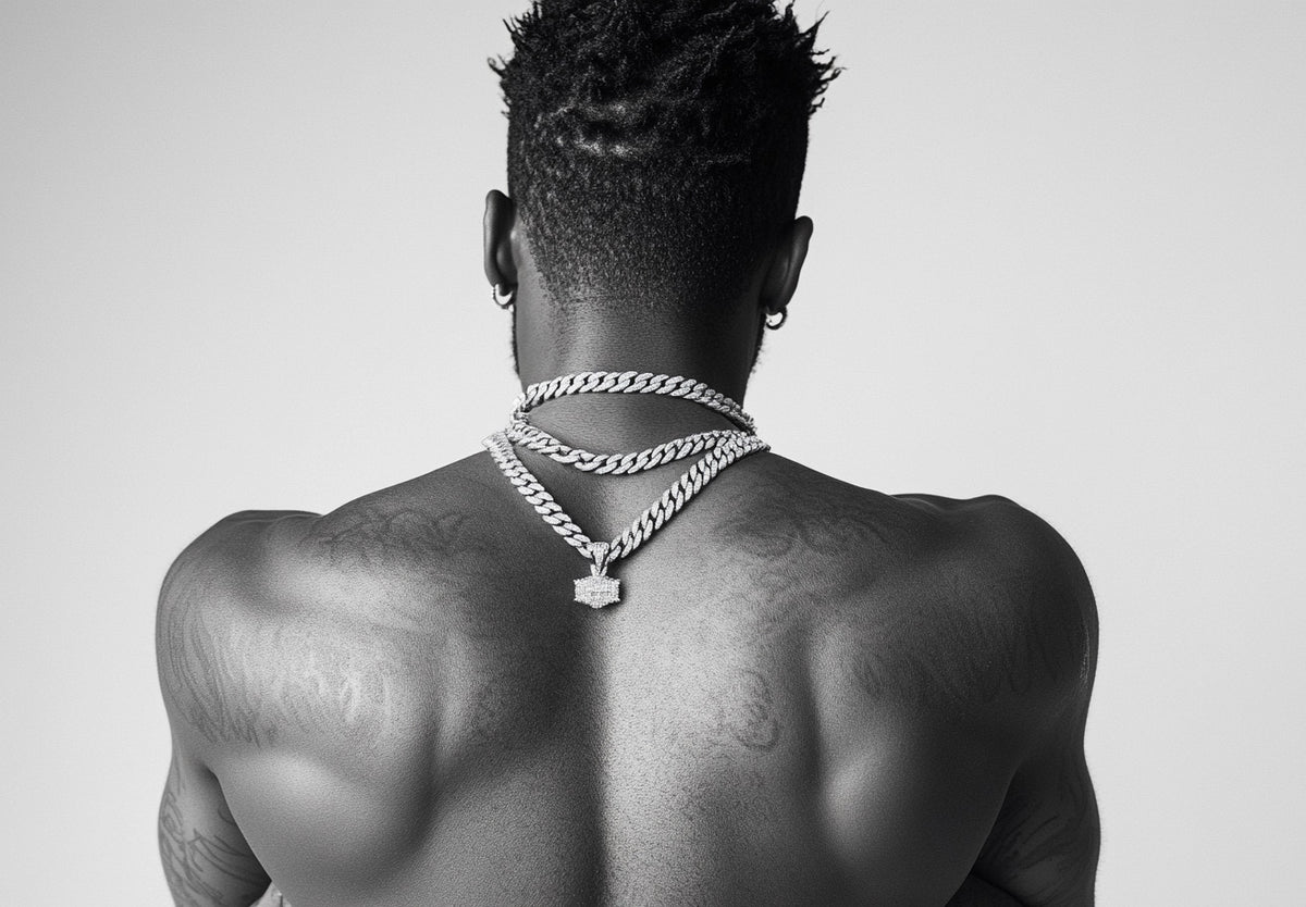 Free stock image back of black man with diamond chain necklace and tattoe